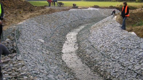 A Weldmesh river bed and bank mattress installation.