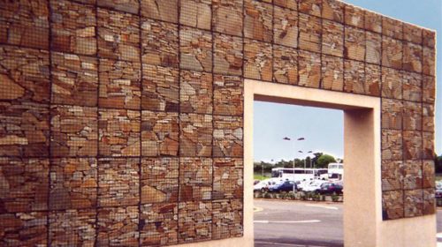 A front view of a free standing gabion wall