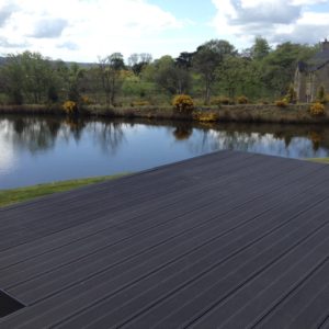 Private Dwelling Ballymena Co Antrim_Elevated deck with onto steel structure_295mm Charcoal Deck 3 - Copy (1)